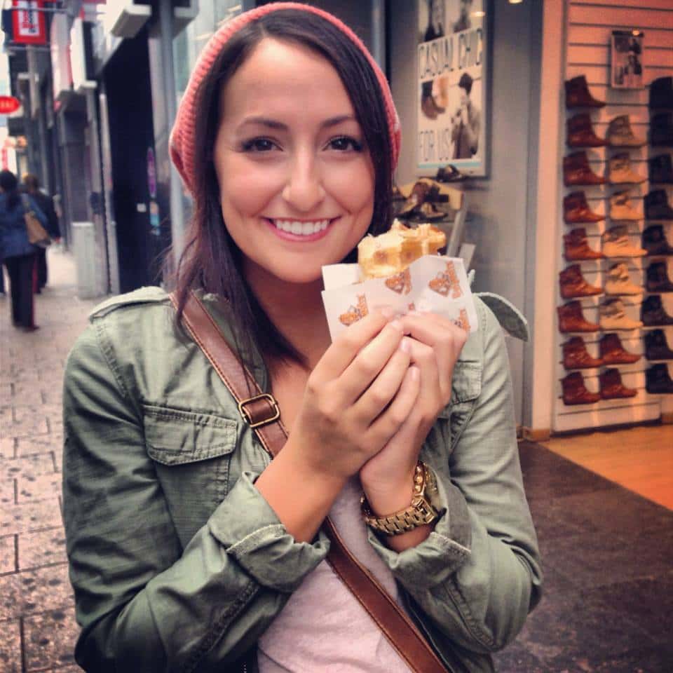 Backroads leader Marlee Newman eating a Belgian Li&egrave;ge Waffle