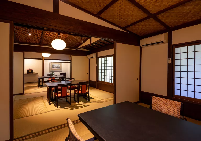 Indoor Japanese-style room with dining tables and chairs