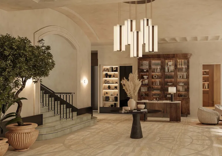 The lobby of the CORI Hornbæk Hotel in Denmark, that features a large modern chandelier.