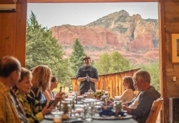 Dining against the backdrop of red rock desert.