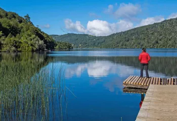 Backroads Hiker on Dock at lake in Chile