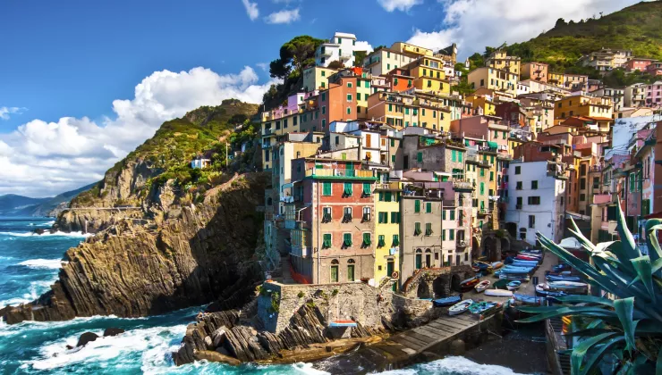 Cliffside by the ocean with buildings on top
