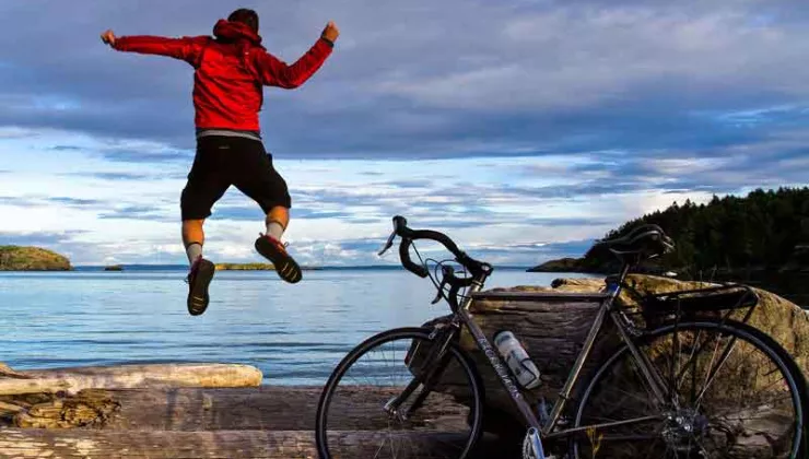 The San Juan Islands victory jump after an epic ride to this beautiful view