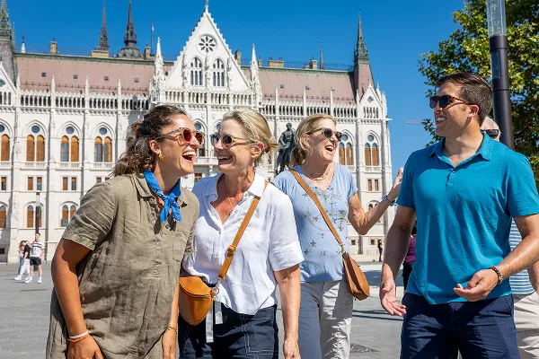 Group of Backroads guests laughing while walking