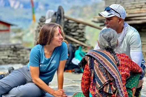 Backroads guests chatting with a local in Nepal