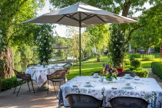 table under umbrella in the yard