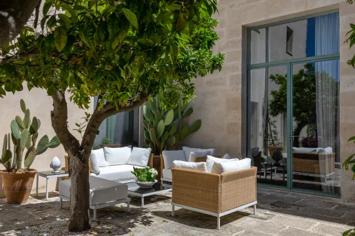 outdoor patio with seating and trees
