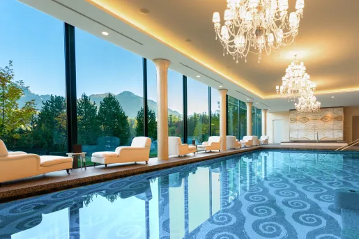 pool with chandeliers and view of mountains