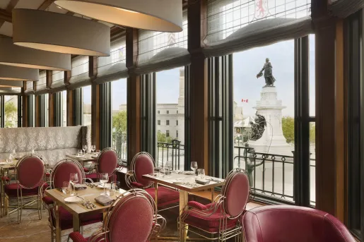 ornate dining room overlooking statue