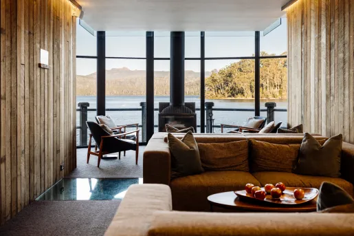 couches and chairs in windowed room