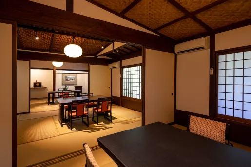 Indoor Japanese-style room with dining tables and chairs