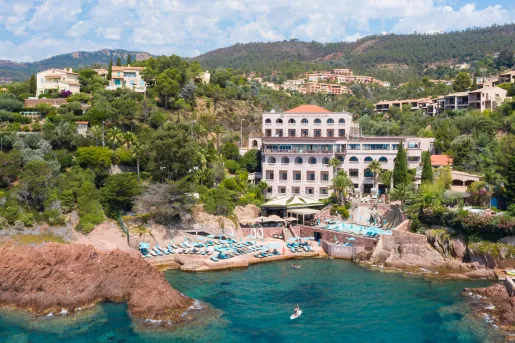 Exterior view of hotel building in front of the ocean