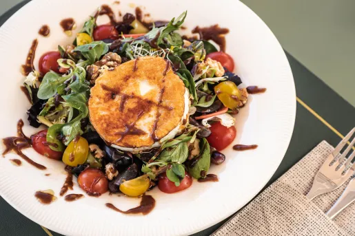 Plate with a salad on top