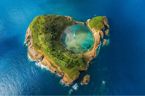 Sky view of a small island in the middle of the ocean