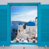 Light blue windowsill, overlooking blue and white Mediterranean domed houses.