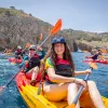 Group of happy young kayakers