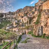 Wide shot of Sassi di Matera and it's mountainside huts.
