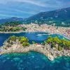 View of cottage lined islands in clear blue water