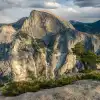 A view of Half Dome from the peak of a nearby mountain.