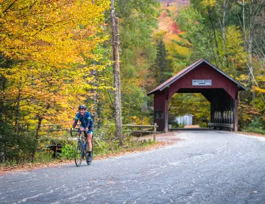 Guest cycling out from bike bridge.