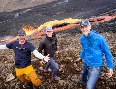 Three Backroads hikers by lava flow on the Iceland Ocean Cruise Walking & Hiking Tour
